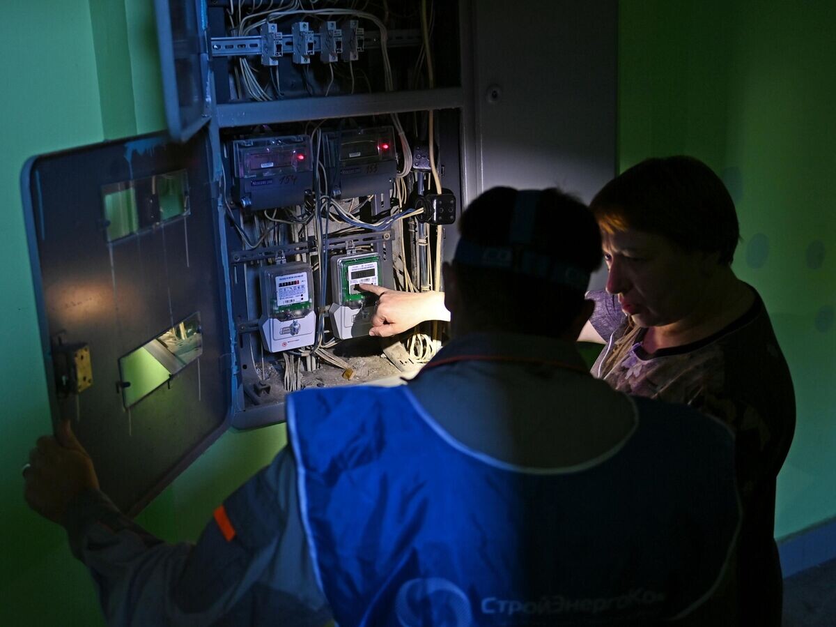    Замена электросчетчика© РИА Новости / Григорий Сысоев