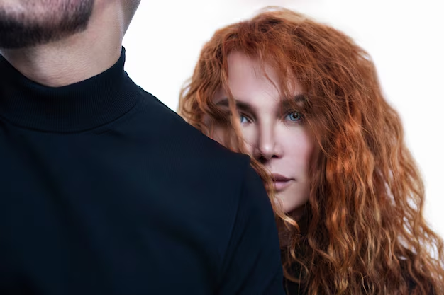 https://img.freepik.com/premium-photo/beautiful-woman-with-red-hair-stands-man-s-back-feelings-relationships-couple-close-up_120897-3295.jpg