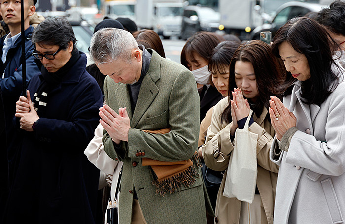    Памятные мероприятия в Японии в 14-ю годовщину землетрясения и цунами 2011 года.FRANCK ROBICHON/EPA/TASS