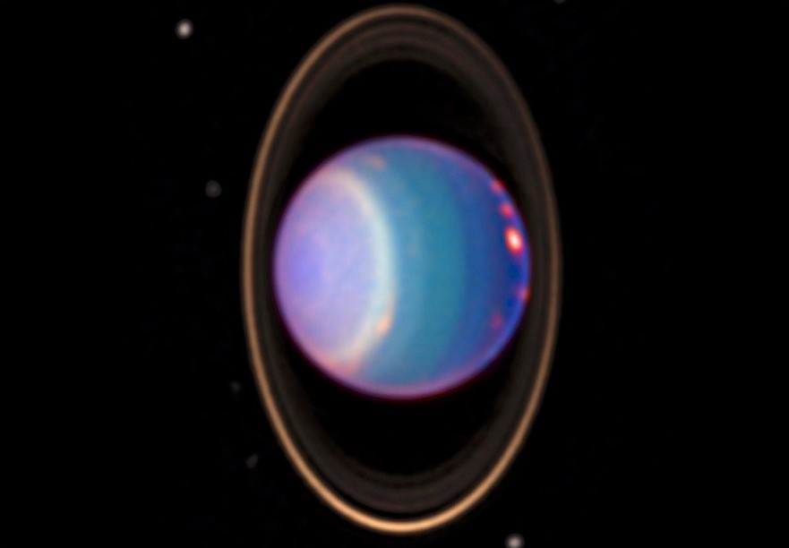 Уран с кольцами и спутниками. Снимок NASA.