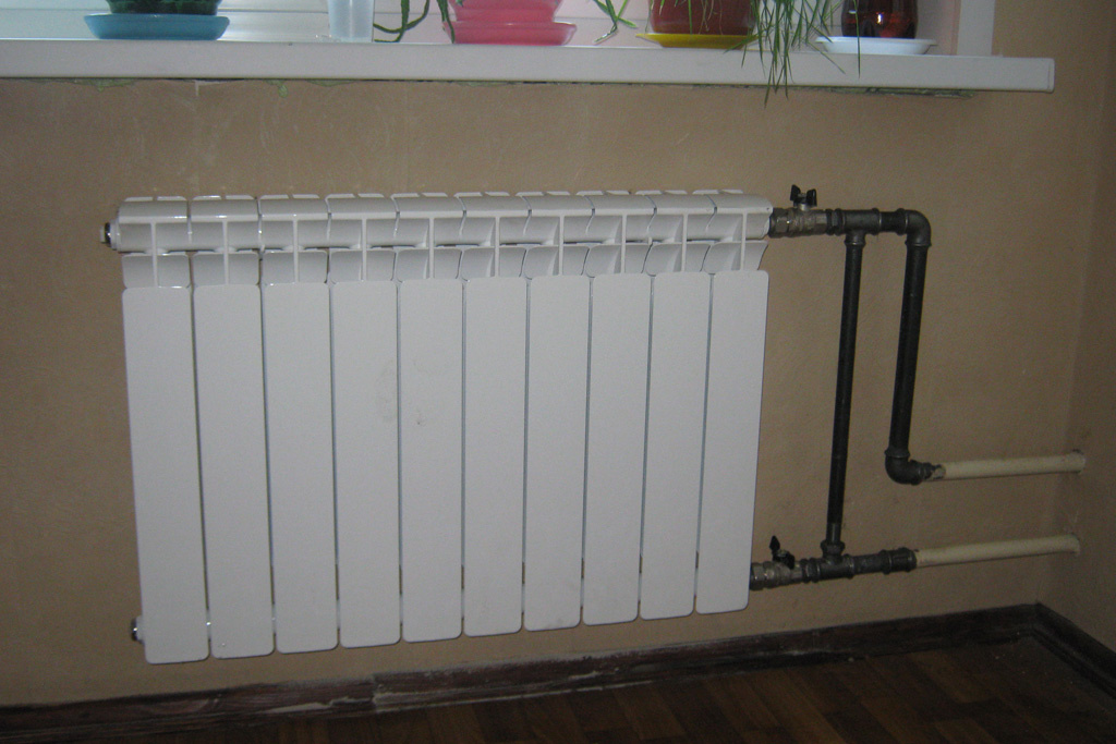 Биметаллический радиатор в квартире