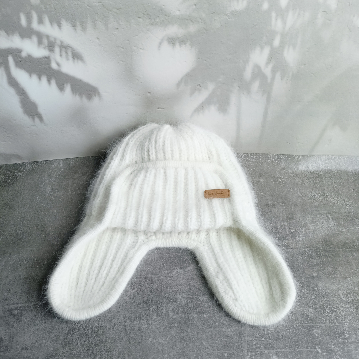 Женская шапка-ушанка связана из пряжи пух норки работа автора.