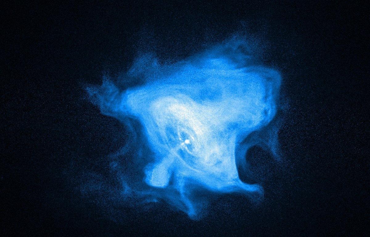 Крабовидная туманность (изображение в рентгеновских лучах), хорошо видна внутренняя ударная волна, свободно распространяющийся ветер, а также полярное струйное течение (джет) / © Wikimedia