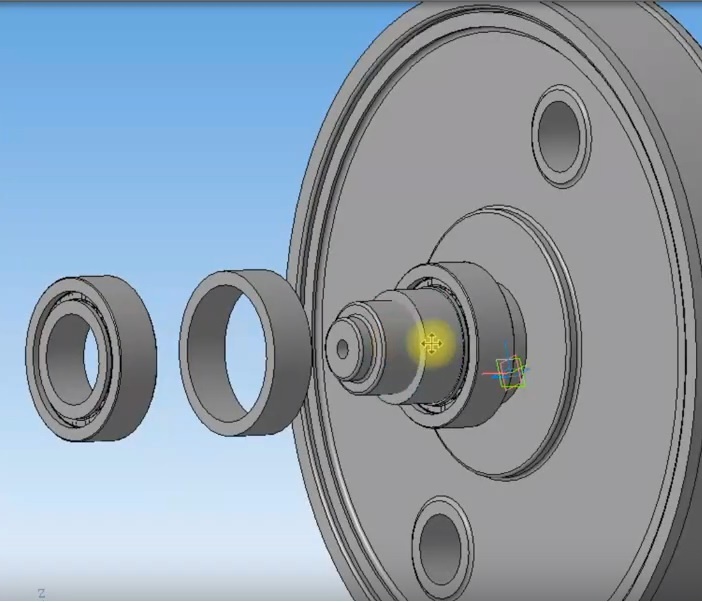 На "подбуксовую шейку* оси колесной пары одеваются два роликовых подшипника и дистанционные кольца между ними