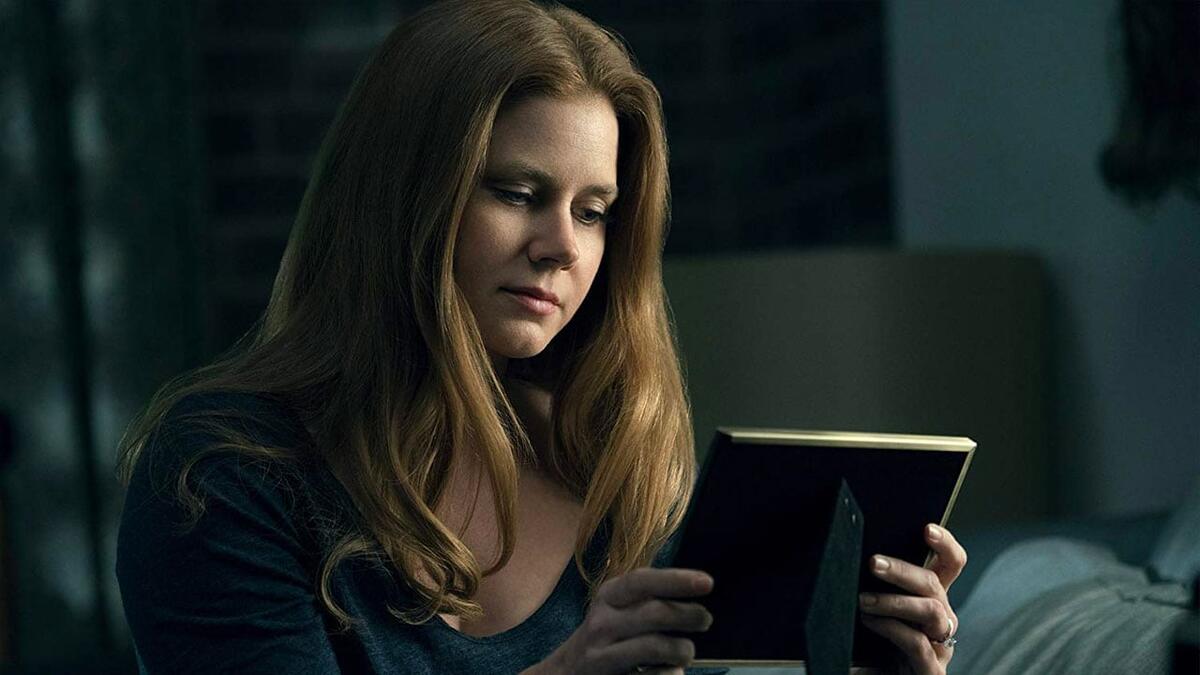 Кадр из фильма «Женщина в окне» (2021)