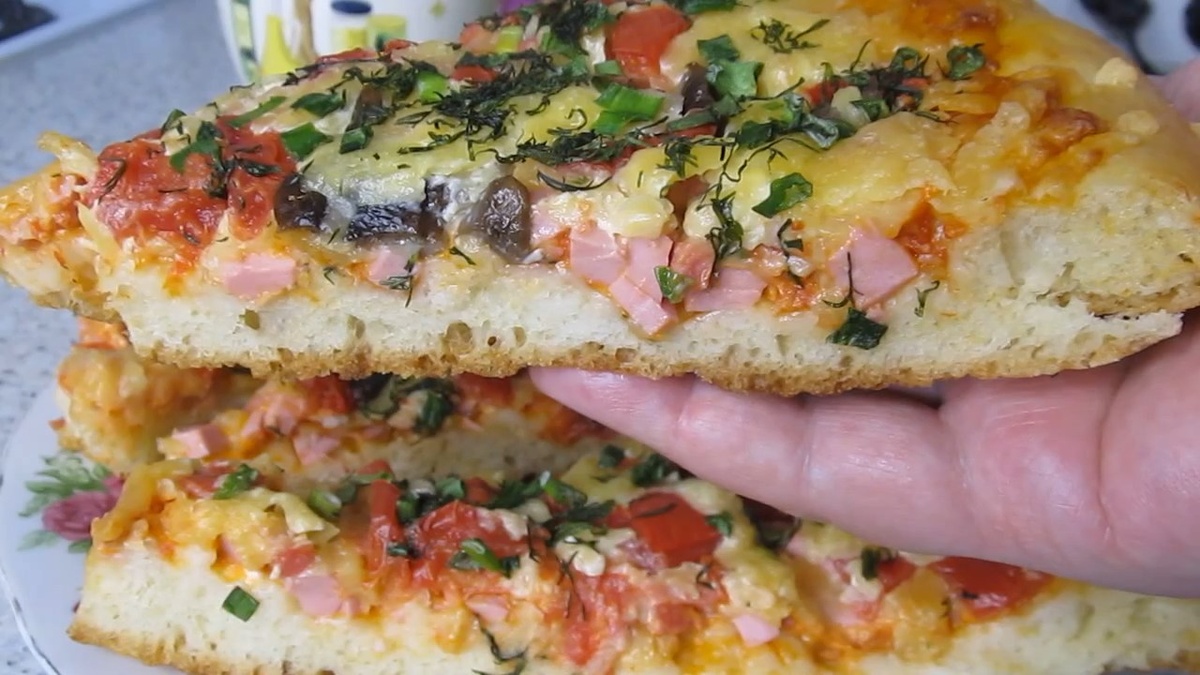 Хотите тоньше? Рахделите тесто на две пиццы!