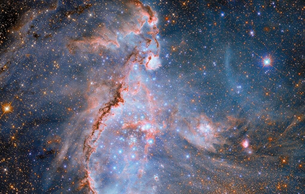 Звездное скопление NGC 346 в галактике Малое Магелланово Облако. Источник: ТАСС (https://nauka.tass.ru/nauka/23601531)