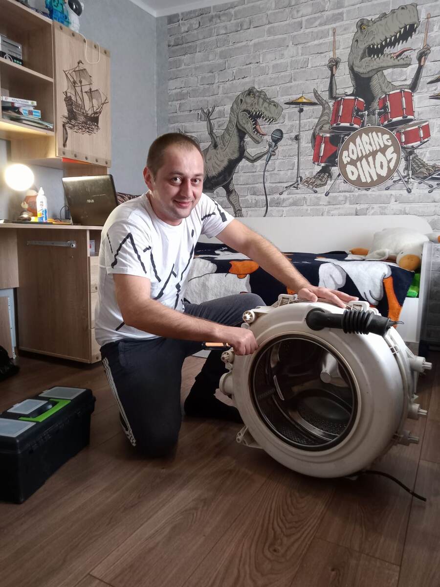 Мастер по ремонту стиральных машин.