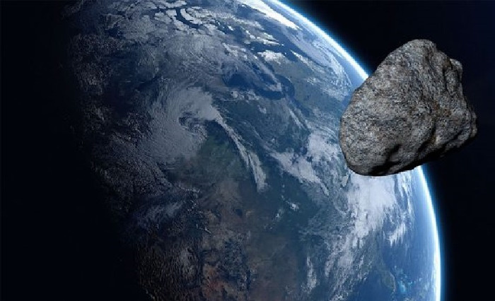 Астероид и Земля - символическое изображение. © NASA