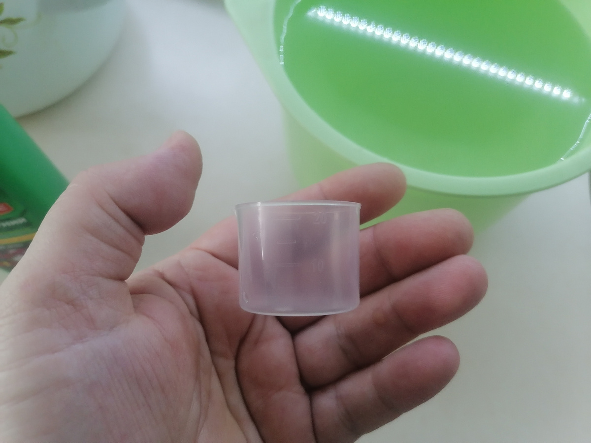 Прозрачный мерный колпачок 