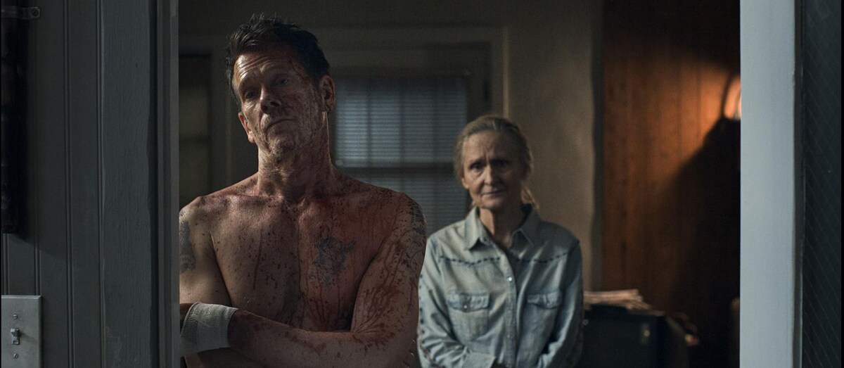 Кевин Бейкон на кадре из «Охотника за головами»