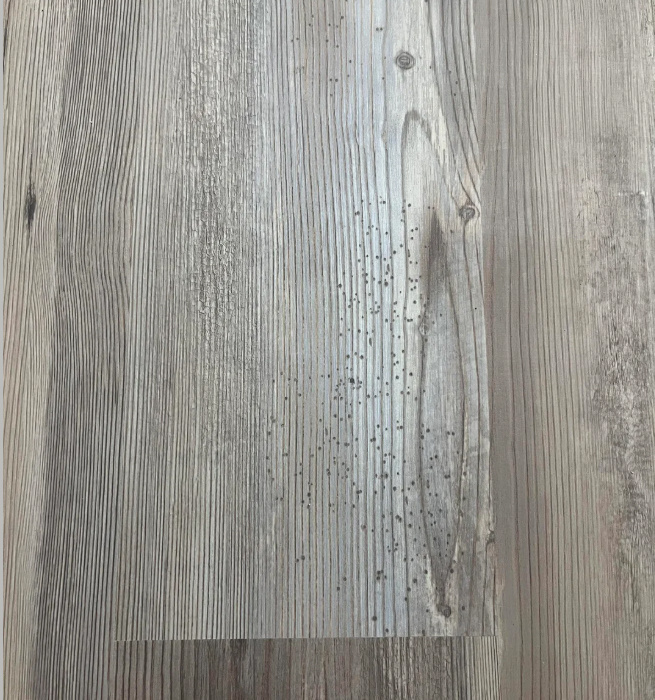 На фото вы видите искусственные вкрапления черных точек 