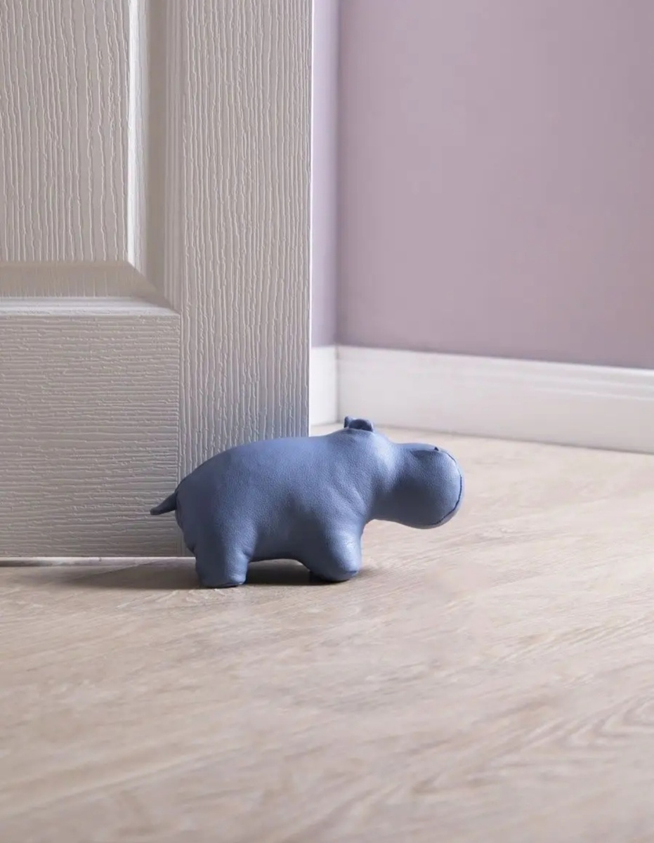 Дизайнерский фиксатор двери. Дорого, но красиво. 