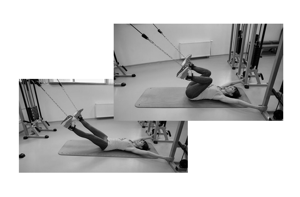 Тяга двумя ногами обеих ног к животу с верхнего блока МТБ