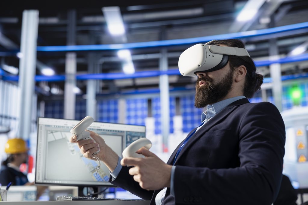    Photovoltaics factory employee using VR equipment to conduct robotic machinery testing. Solar panels plant specialist using virtual reality tech to consult manufacturing parameters, making adjustments Кристина Николаенко