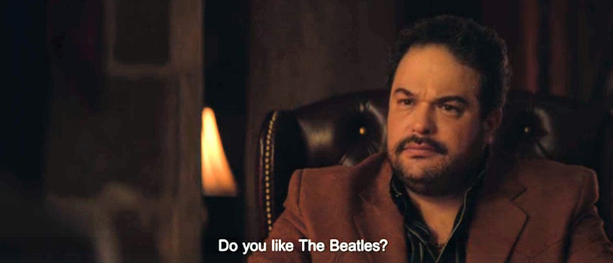 Кадр из фильма "Опасный бизнес". Вопрос от босса мексиканской мафии. Лично я  битломан. 