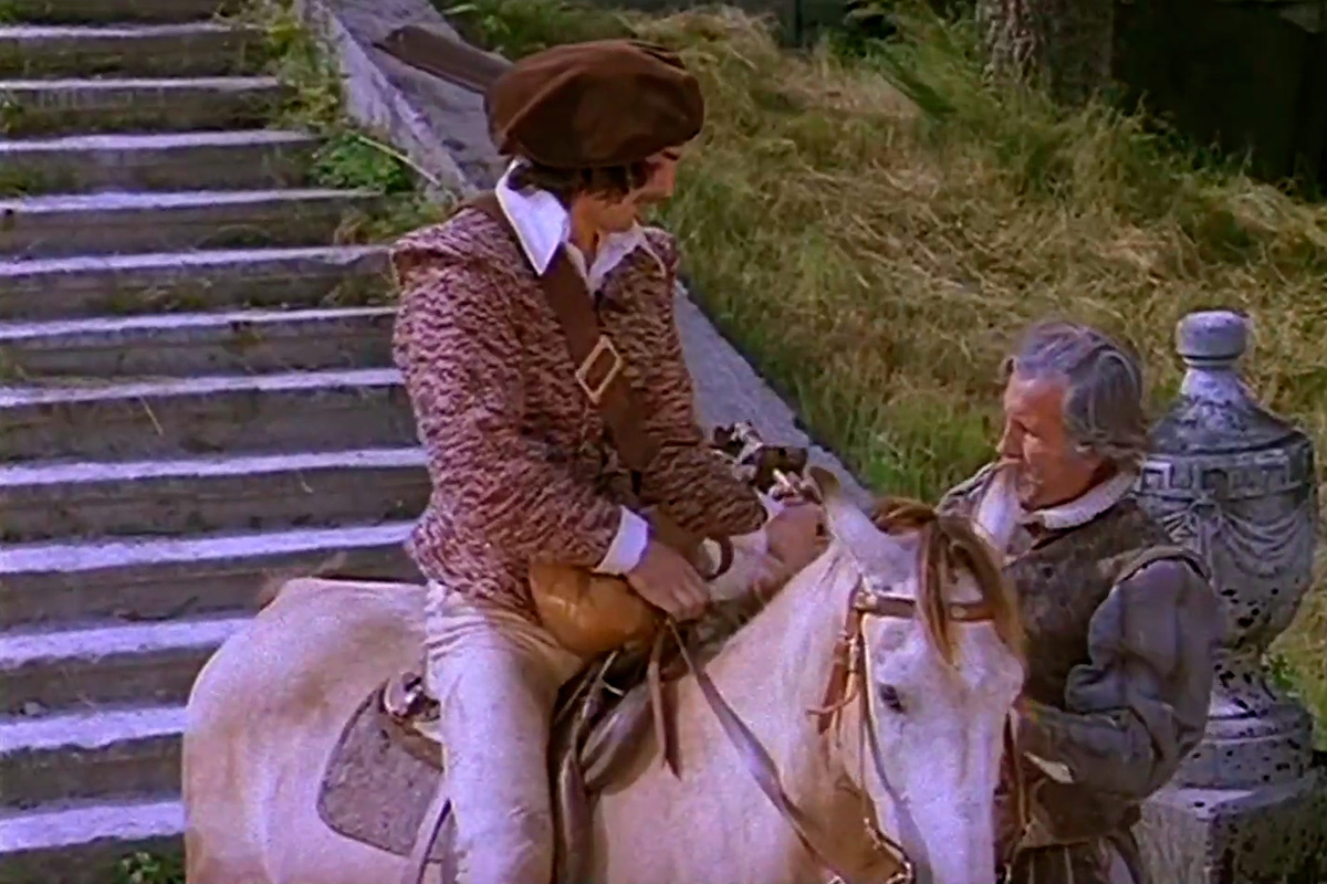 Odesa Film Studio / YouTube📷Михаил Борский в роли Д’Артаньяна на фоне лестницы Свиржского замка, кадр из фильма «Д’Артаньян и три мушкетера»