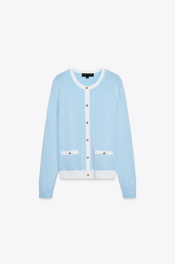 Конечно, этот кардиган связан на машине, но здесь очень хорошо видна разница между горловинами спинки и переда