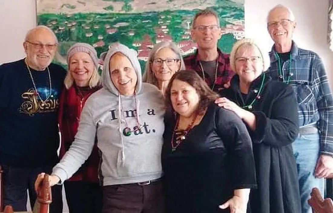 Карен Людерс с мужем Уильямом во время вручения рождественских подарков пациентам психиатрической клиники Виннебаго.