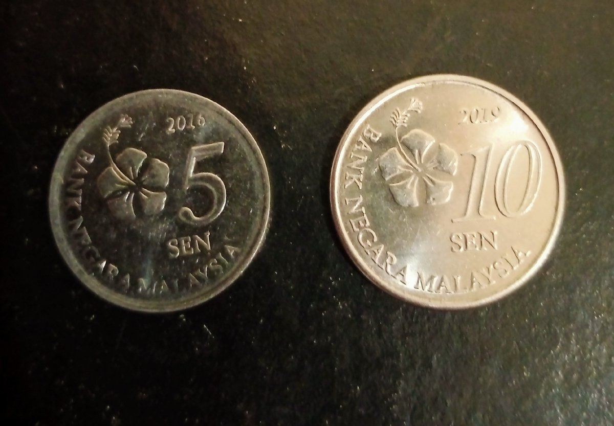 Аверсы монет 5 и 10 сен Малайзия.