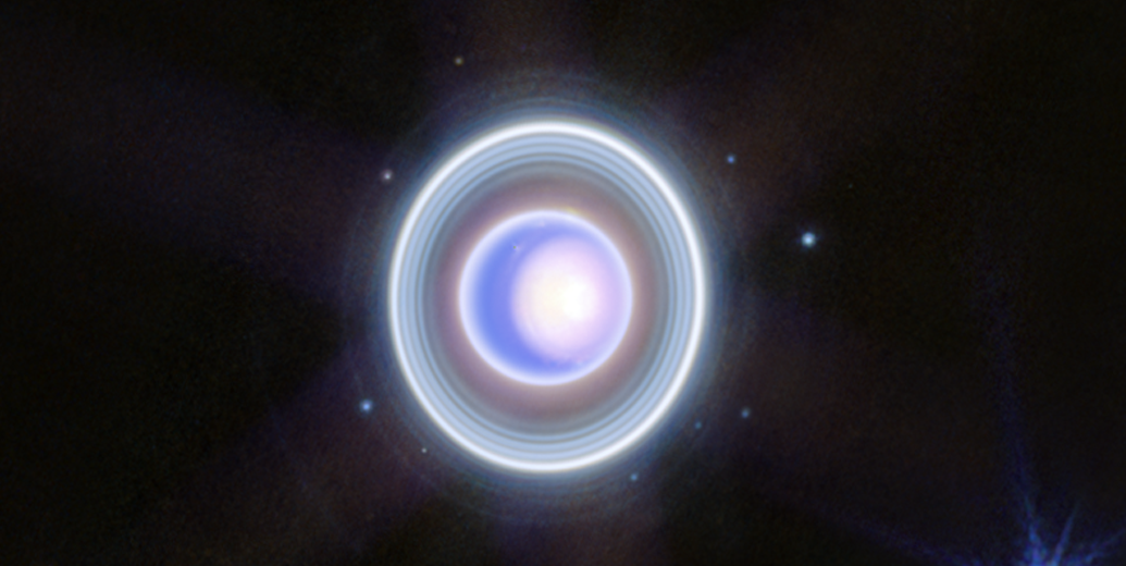 Уран и его система колец. Изображение получено орбитальным космическим телескопом «Джеймс Уэбб» в инфракрасном диапазоне излучения (Источник изображения: https://webbtelescope.org/contents/news-releases/2023/news-2023-150?itemsPerPage=15&page=4)