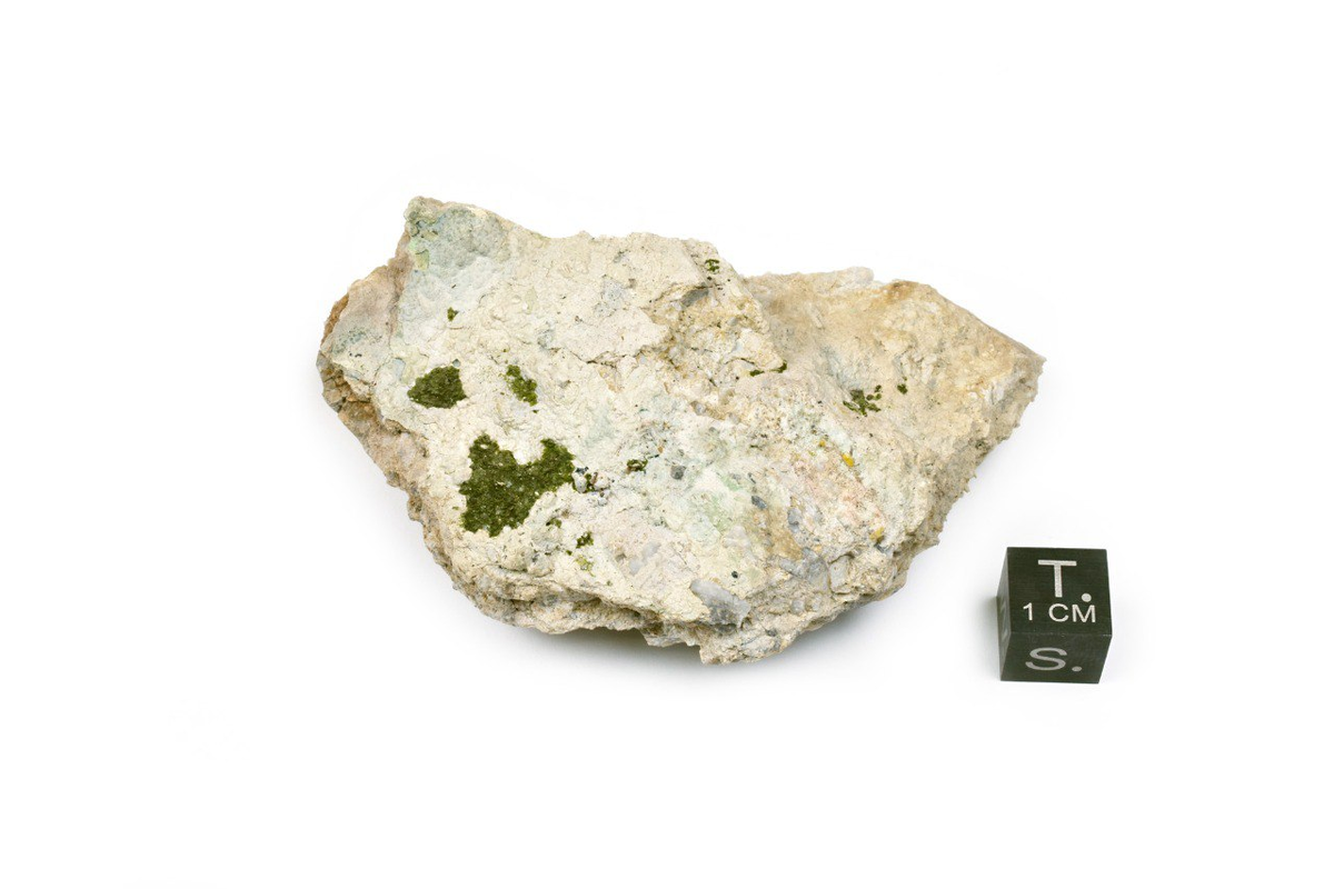 Пример классического "узбекита" - непонятные корочки зеленого цвета, содержащие ванадий.