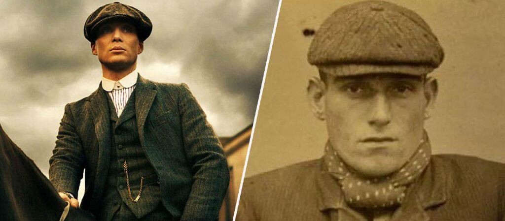 На этом кадре из сериала изображены Томас Шелби и Артур Шелби — центральные персонажи, олицетворяющие вымышленную версию банды. Сериал придаёт им харизму, стратегическое мышление и сложные моральные дилеммы, превращая их в антигероев с глубокой проработкой характеров. 