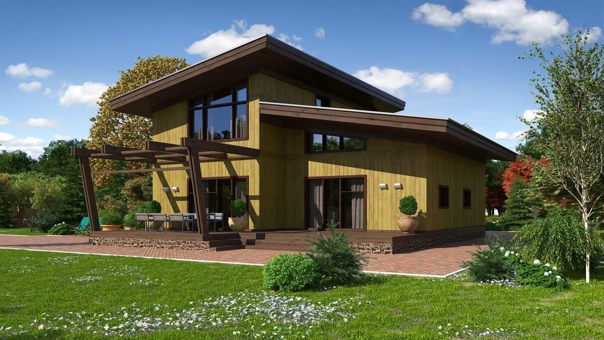 Внешний фасад загородного дома из вертикального бруса NATURI "Алхелиум"