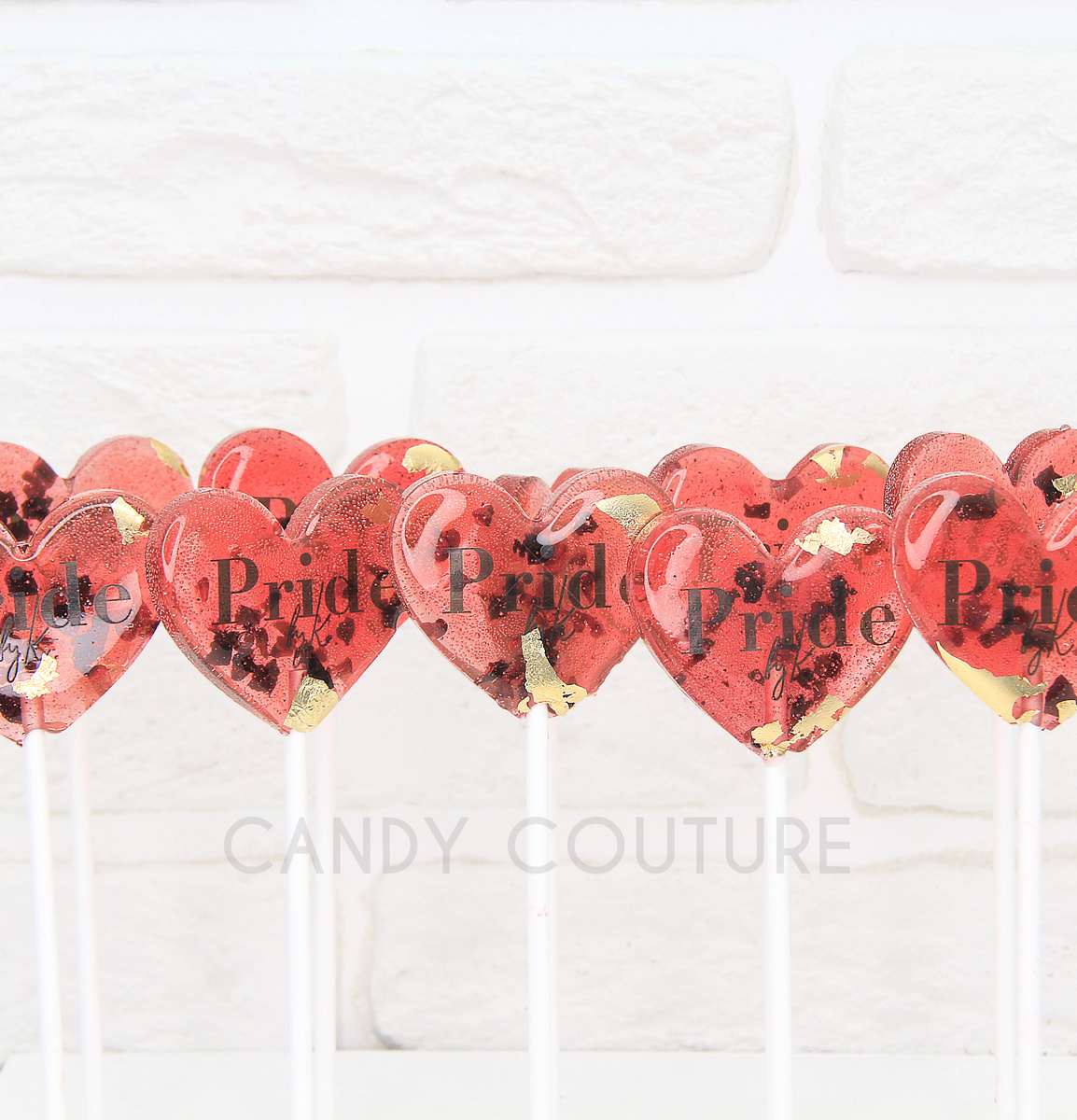 Леденцы из изомальта с сублимированными яголами, золотой поталью и лого