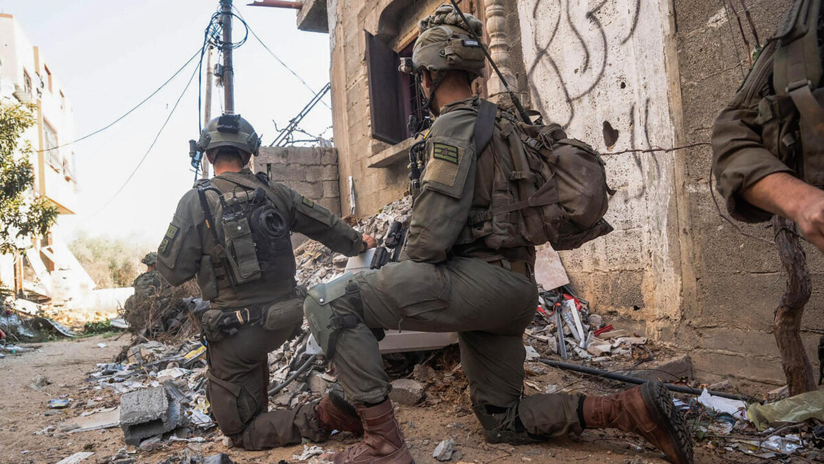 14 ноября 2024 года израильская армия опубликовала фотографию солдат на земле в секторе Газа. © AFP