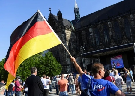    В Германии две беды: Путин и АдГ