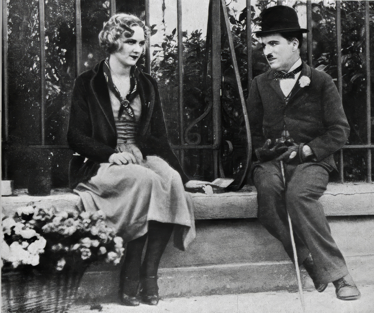 Чарли Чаплин и артистка Вирджинии Черрилл. Фильм "Огни города".
