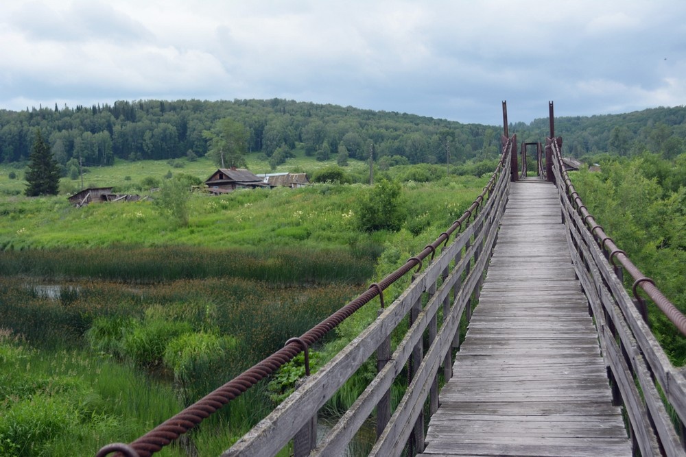 Мост через реку Бердь в поселке Петени