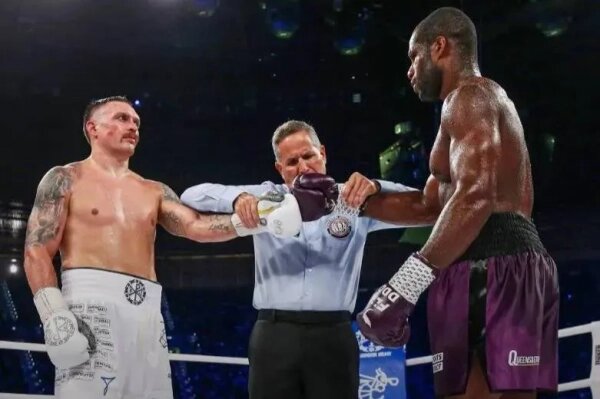 Усик и Дюбуа проведут бой за звание абсолютного чемпиона мира 19 июля. Обложка © Х / Boxing News