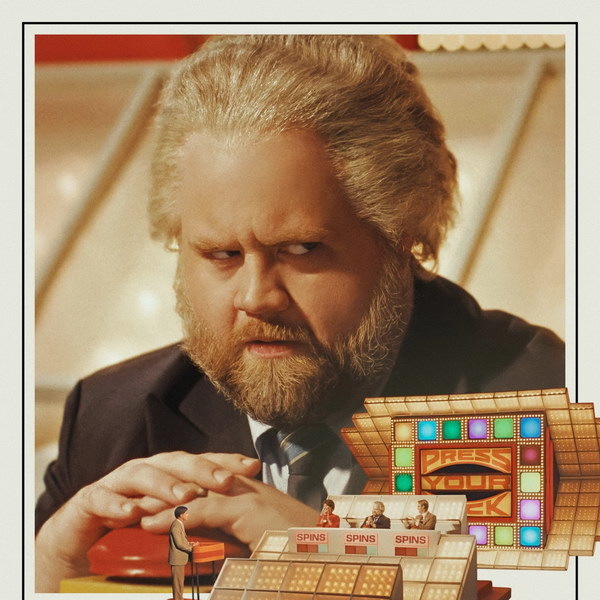     Пол Уолтер Хаузер пытается сорвать банк в телеигре в трейлере «Как стать миллионером»