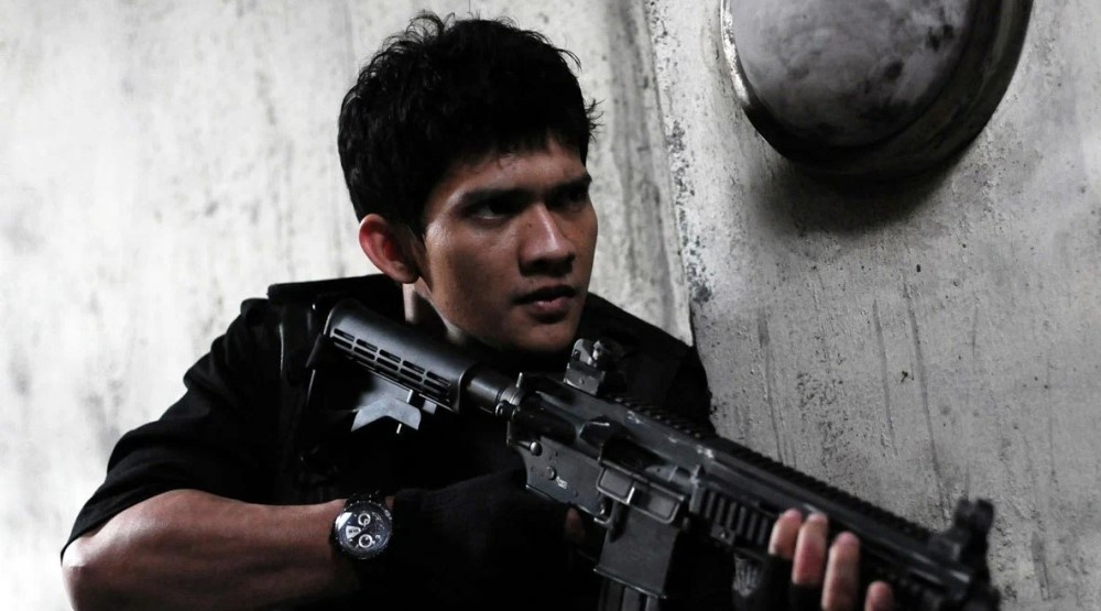     Кадр из фильма «Рейд» (2011)