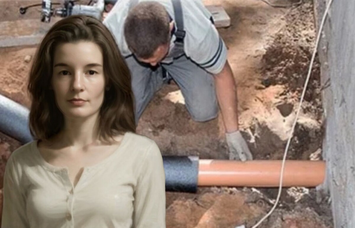 За спиной моей помощницы рабочий утепляет трубу материалом, для использования в грунте не годным