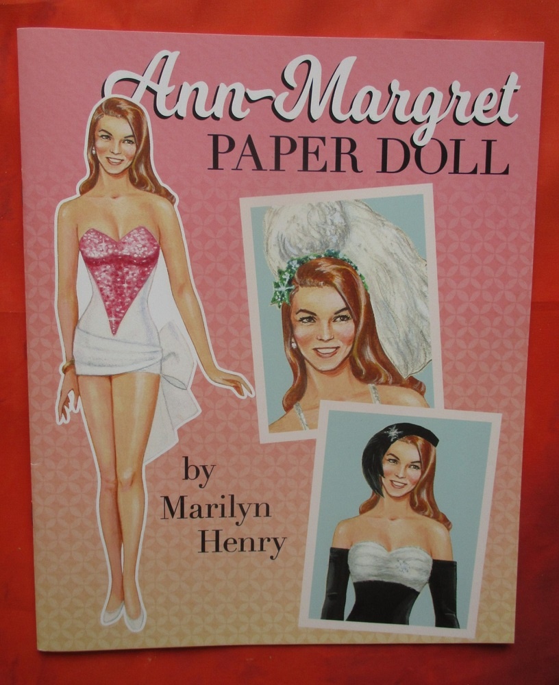 Передняя сторона обложки с самой куклой.