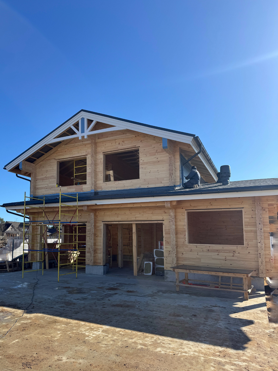 Проект гаража из клееного бруса с котельной в пристройке и гостевым домом на втором этаже