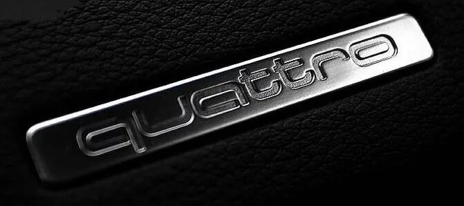 Шильдик quattro.