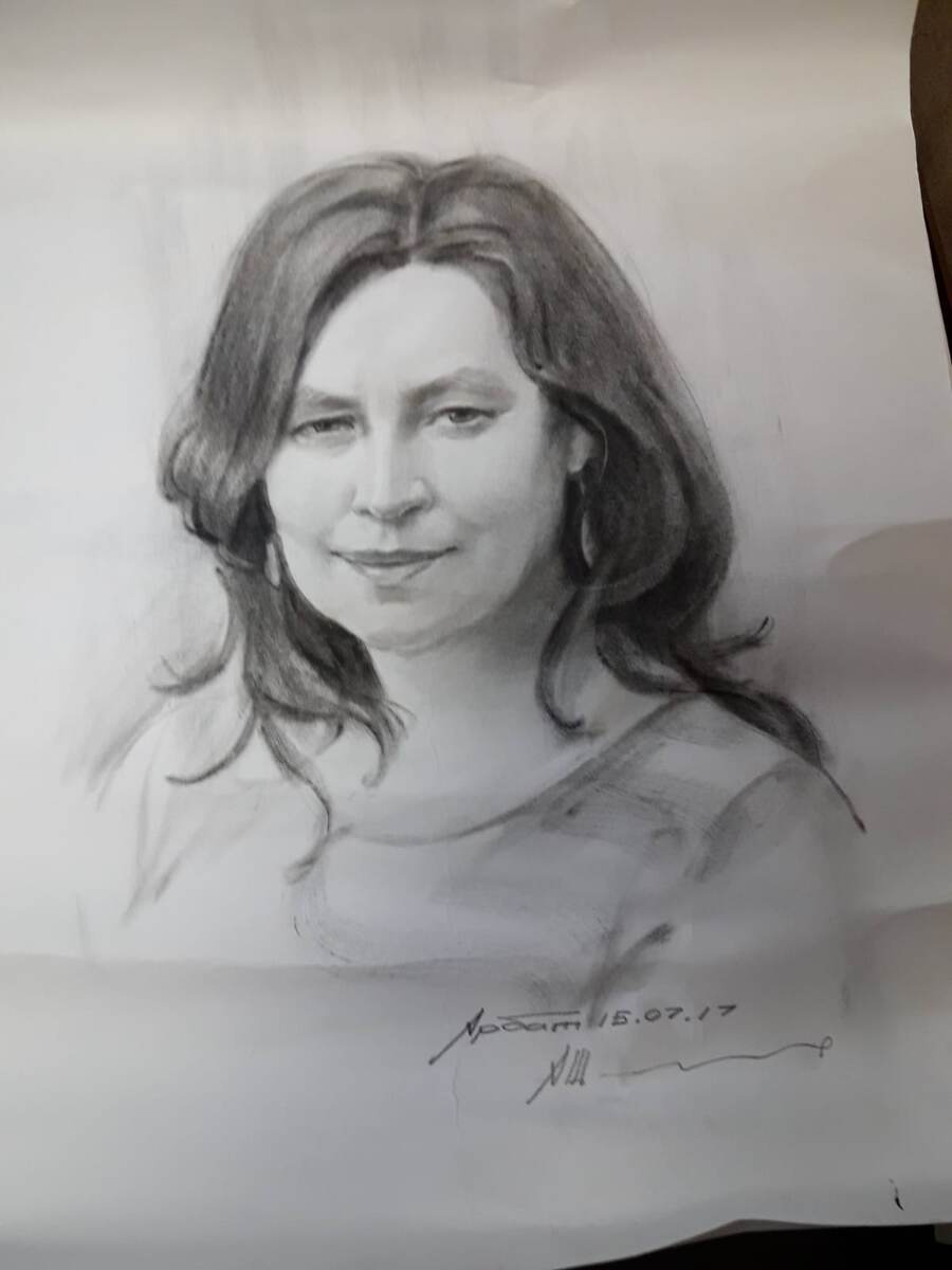 Портрет в исполнении  арбатского художника