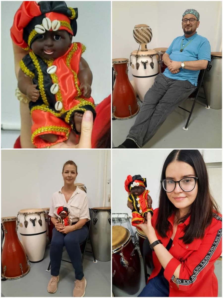 Первое фото сверху - кукла Элегуа (Elegua), второе - участник интервью профессор Михаил Носоновский, третье - участница интервью психолог Инга Рекшан, четвертое фото - я с куклой Элегуа ;). 