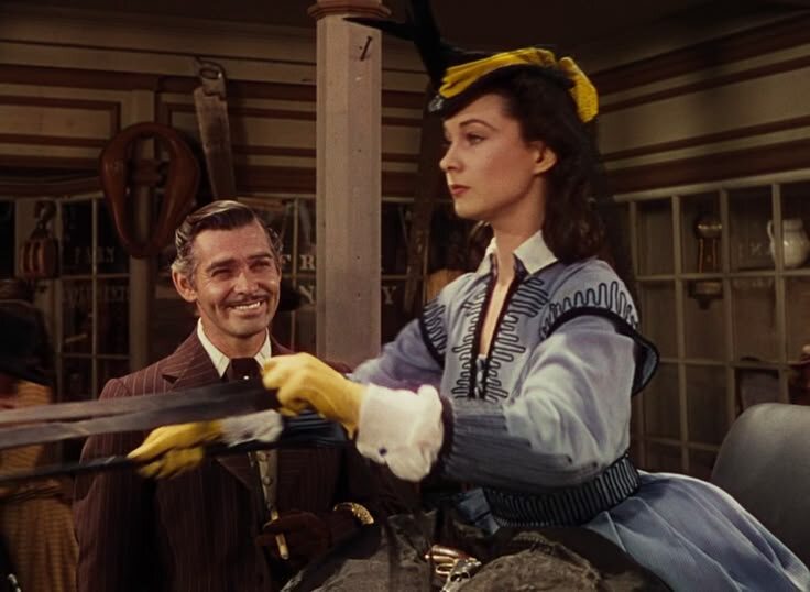 Кадр из фильма «Унесённые ветром». Ретт провожает Скарлетт на лесопилку.