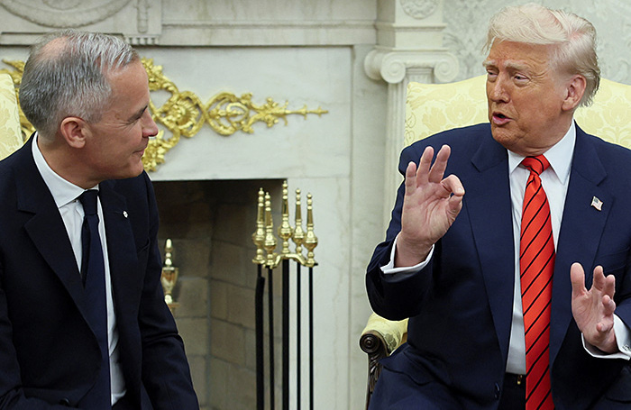    Марк Карни и Дональд Трамп.REUTERS/Leah Millis