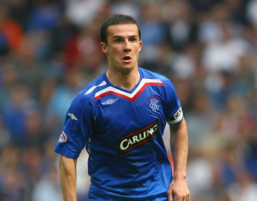 В этом фото легендарно всё: характерная гримаса, классическая форма, повязка и спонсор