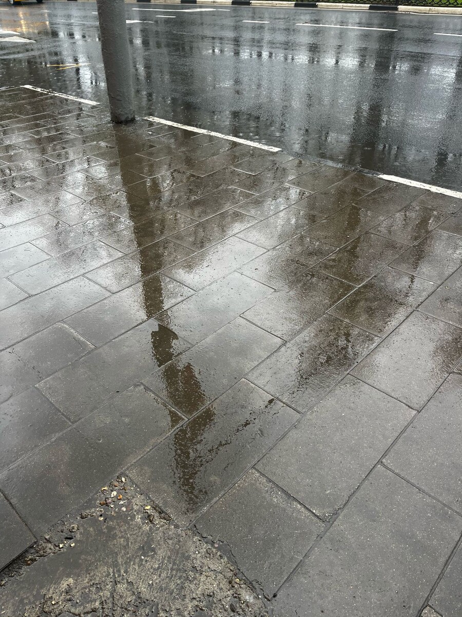 Дождь на одной из краснодарских улиц