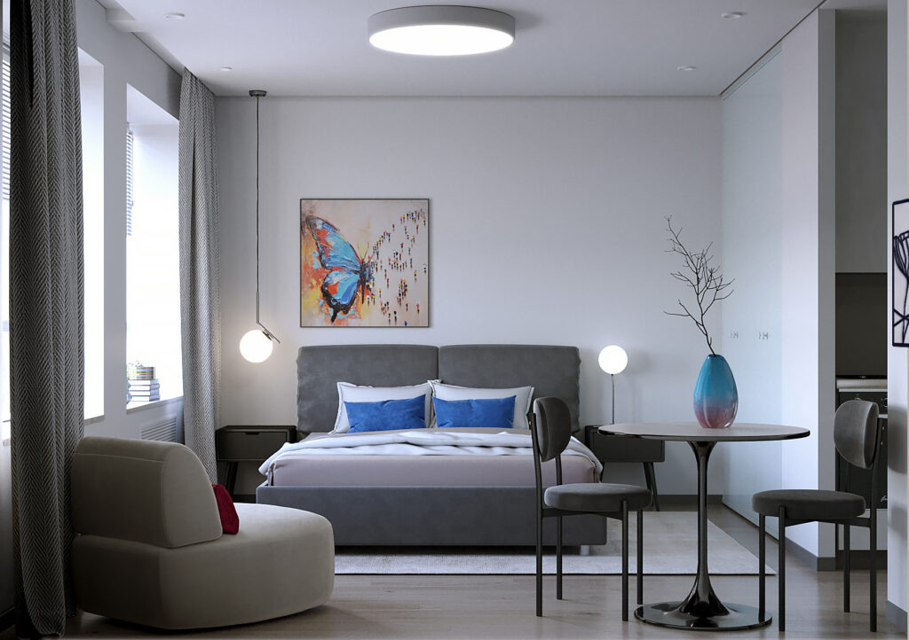 В основной комнате разместились большая кровать с тумбами