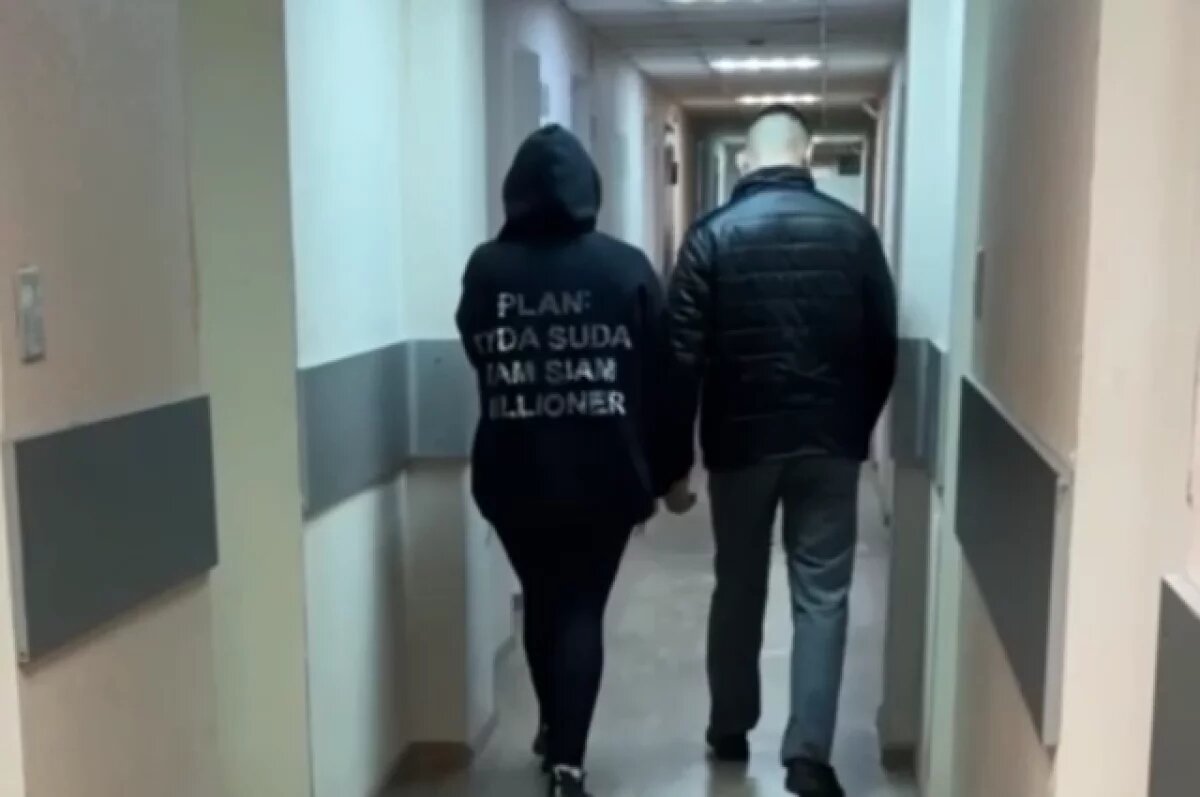    Одна из задержанных.