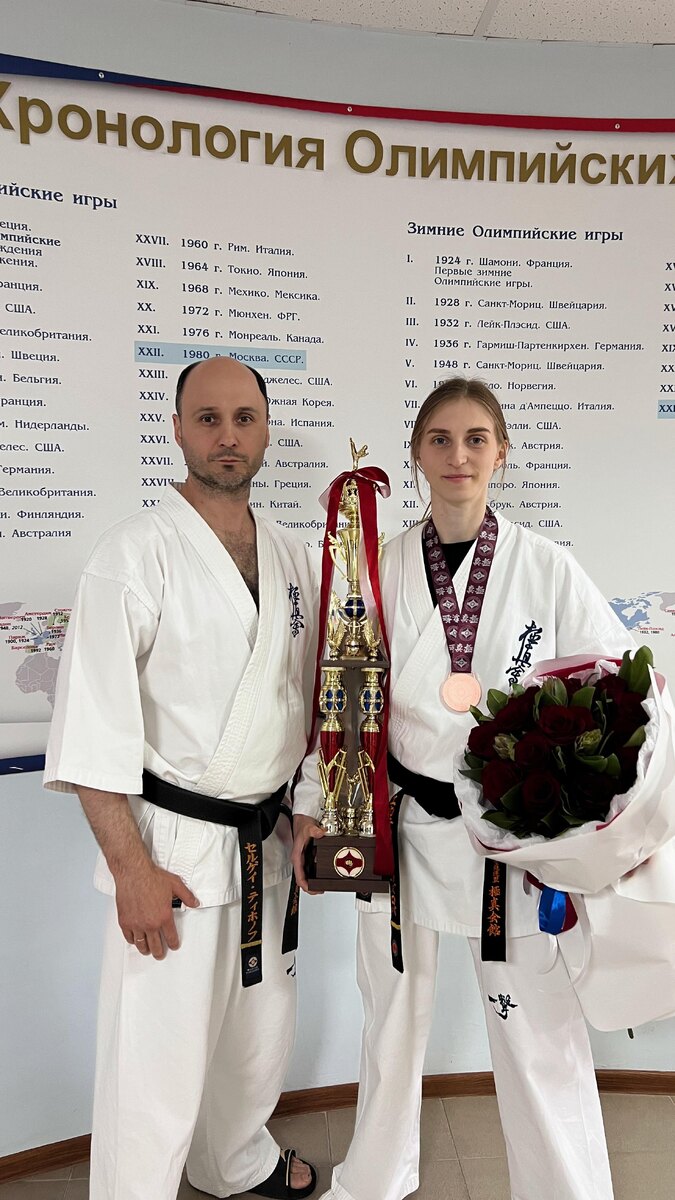 Екатерина Козлова и её тренер Сергей Тихонов .