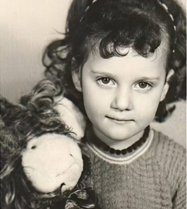    Была одной из 14 детей в семье